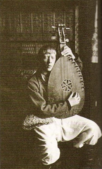 Image - Vladimir Tatlin performing as a blind bandura player (Berlin, 1914).